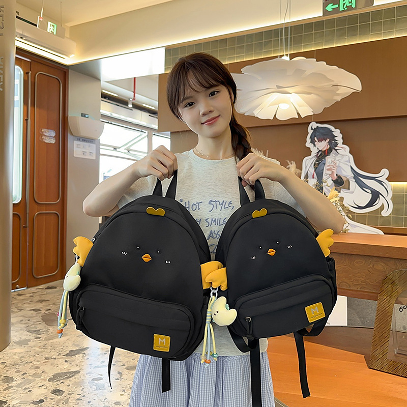 2025 nueva mochila escolar mochila ligera mochila niña lindo jardín de infantes mochila pequeña bolsa de dibujos animados casuales