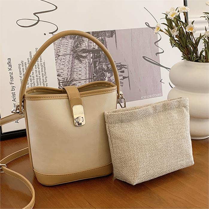 Bolsa de mano coreana de nicho universal, dama 2024 nuevo bolso de hombro, bolso de cubo de moda de alta calidad