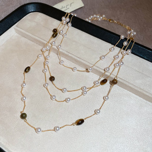 不規則な長いタイプの真珠のネックレスのフランス式の軽い豪華な気質のセーターのチェーンの小さい大衆のシンプルで高級感の項は卸売りの女性を飾ります。