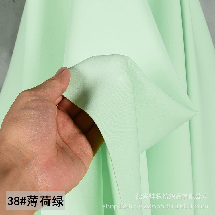 Ice porcelain air layer is cold, smooth solid space cotton cloth knitting four -sided elastic clothing design fabric