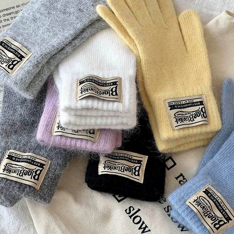 Guantes de invierno caliente estilo coreano de color sólido versátil guantes de lana de punto para mujeres a prueba de viento pantalla táctil guantes de dedos al por mayor
