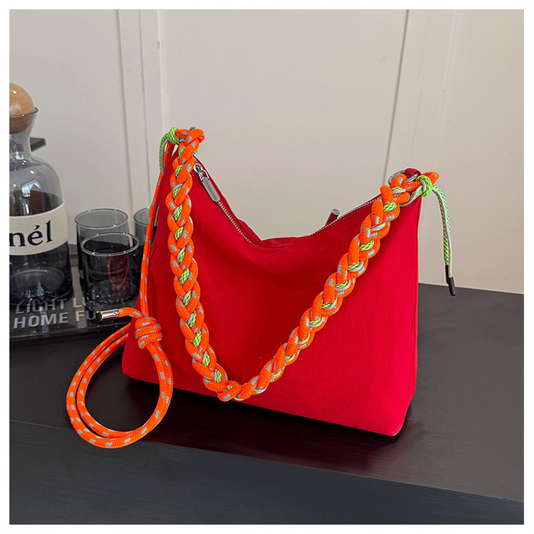 Bolso de tela de nylon de gran capacidad para mujeres 2026 nuevo estilo coreano simple bolso de mochila de nicho de tejido de viaje bolsa