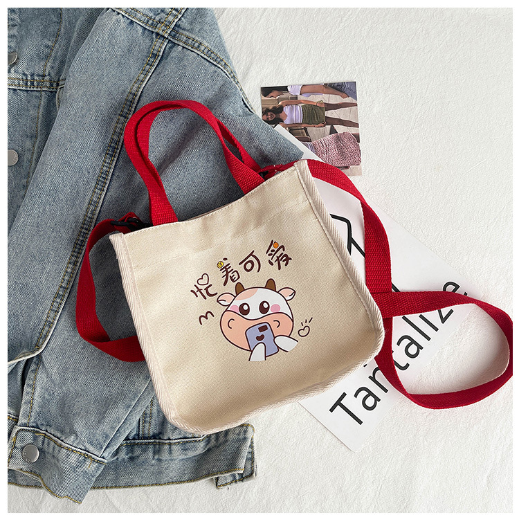 "Bag Girl 2021 New Trendy Korean style, fashionable and personalized printed single-shoulder bag for women, canvas hand-held crossbody small bag. undefined