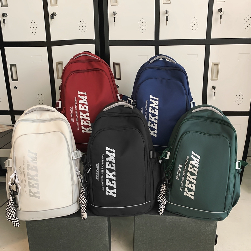 Nuevo estudiante de secundaria y secundaria mochila de gran capacidad Mochila de tela Oxford simple Mochila De estudiante masculino y femenino mochila de estudiante universitario