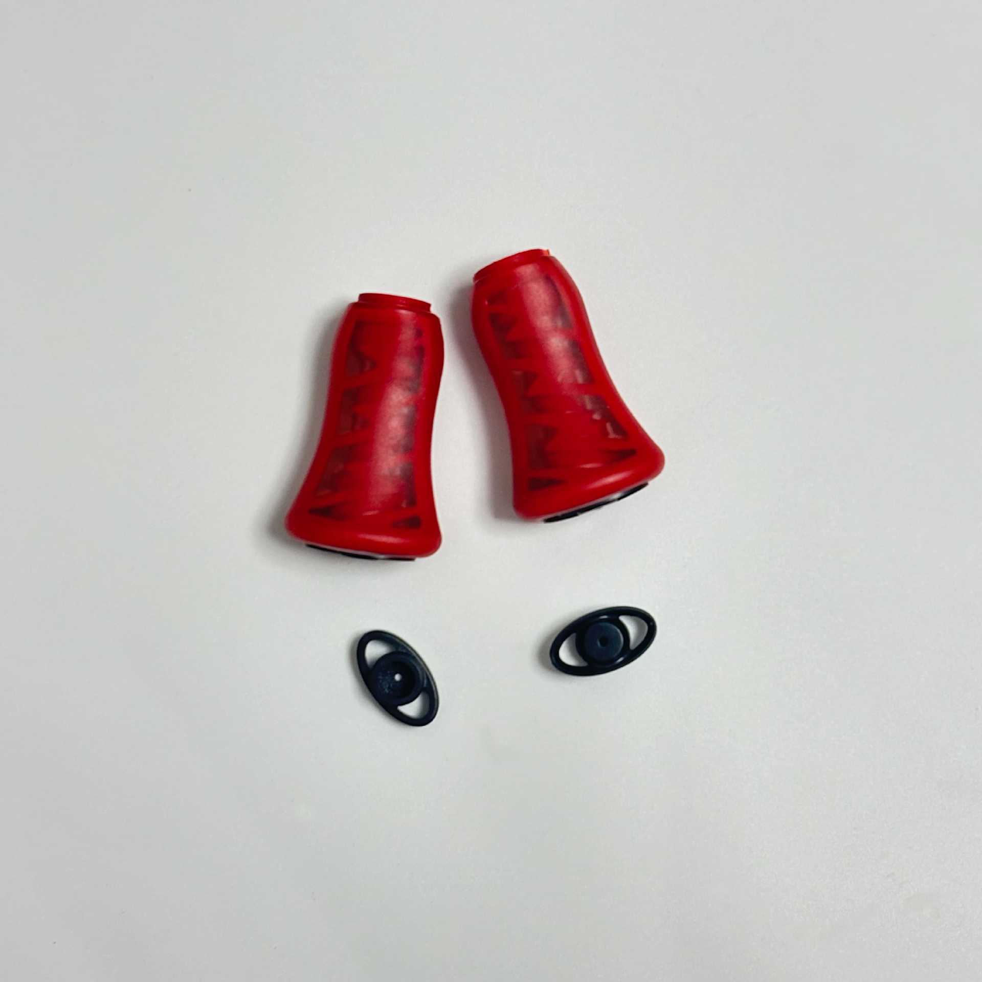 A pair of red silicone grip balls
