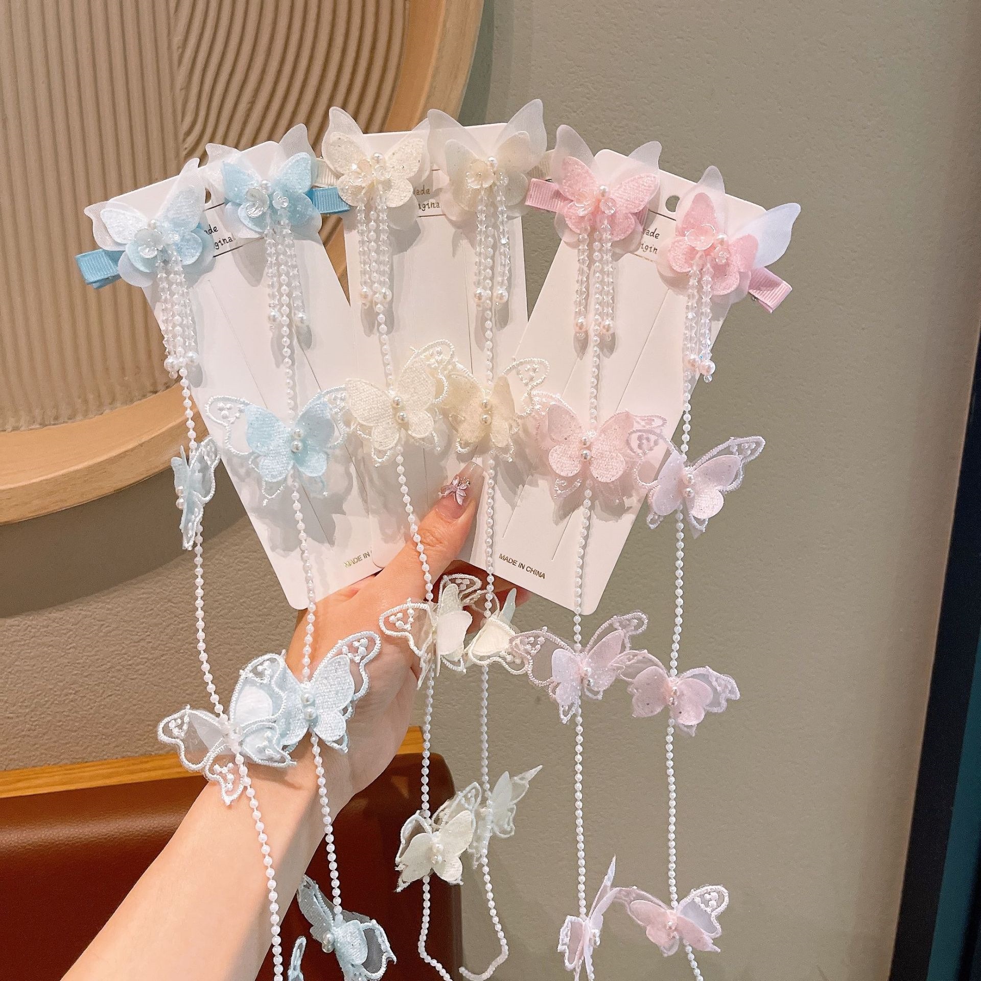 Explosiones de mariposa para el cabello de princesa infantil primavera mariposa de hadas perlas trenzadas brocas de cabello primavera nuevo estilo antiguo