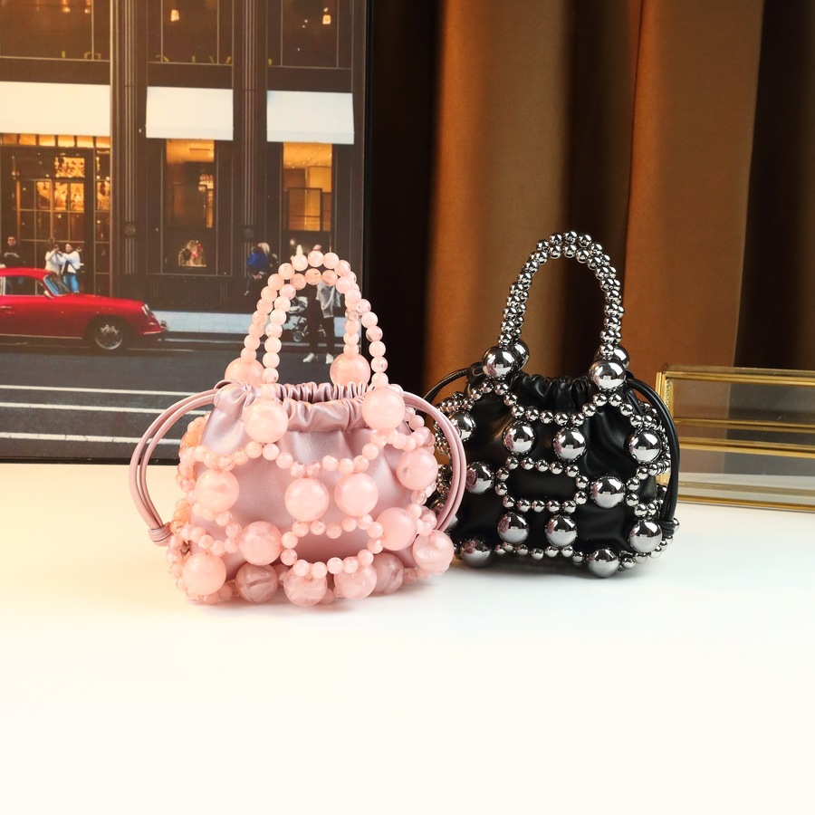 Nuova borsa da donna con design a nicchia in metallo traforato, borsa a secchiello alla moda per feste serali, stile popolare_voghion.com
