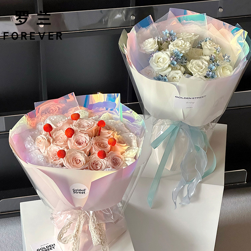 Roland Qixi día de San Valentín maravilloso país de la luz de papel de embalaje ramo de flores de alta calidad sensación de película de color brillante impermeable embalaje hecho a mano