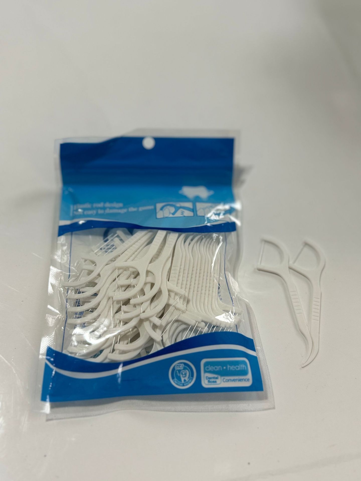 Hilo Dental Desechable – Paquete de 50, Portátil y Práctico, Venta al Por Mayor