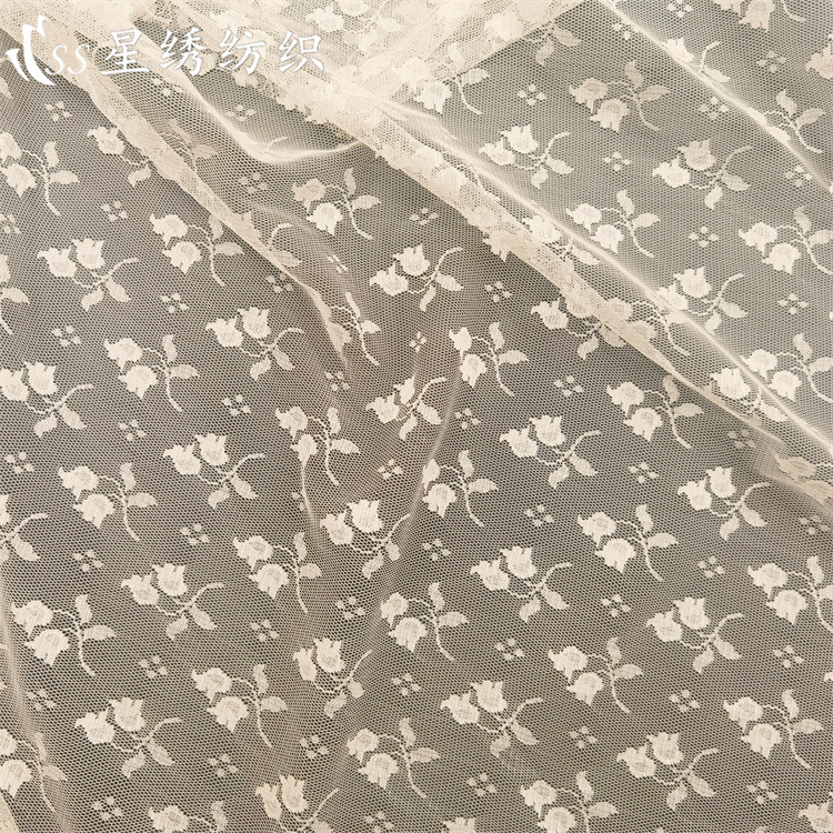 新款全涤提花网布面料小玫瑰花点点花型轻盈柔软女装裙装包包布料