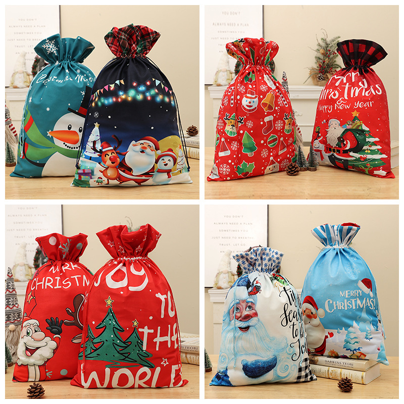 Cross-border new Christmas gift bag blue printed striped drawstring children's candy bag Santa gift bag