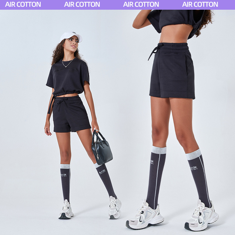 Otoño y invierno nuevo tipo de capa de aire de algodón suelto pantalones cortos deportivos simples para mujeres de doble bolsillo pantalones de yoga