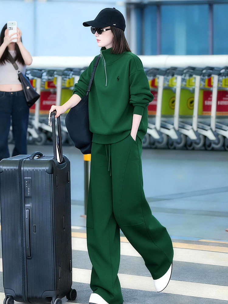 Green colored autumn demi-season sweatshirt with zipper