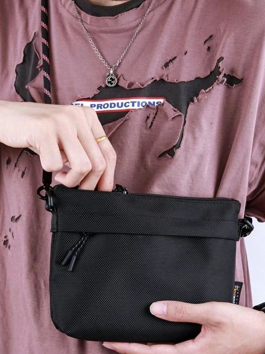 Bolsa de hombro de hombre nueva moda impermeable móvil mochila pequeña mochila casual de gran capacidad mochila