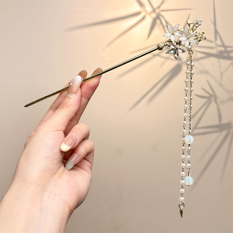 Nueva horquilla china 2025 nuevo estilo estilo antiguo horquilla mujer falda de cara de caballo de alta calidad estilo nacional horquilla de madera paso a paso horquilla tocado