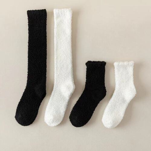 Non-shedding solid-color coral fleece calf socks for women; long stockings with extra fleece lining, thickened and warm; black and white winter knee-high socks.