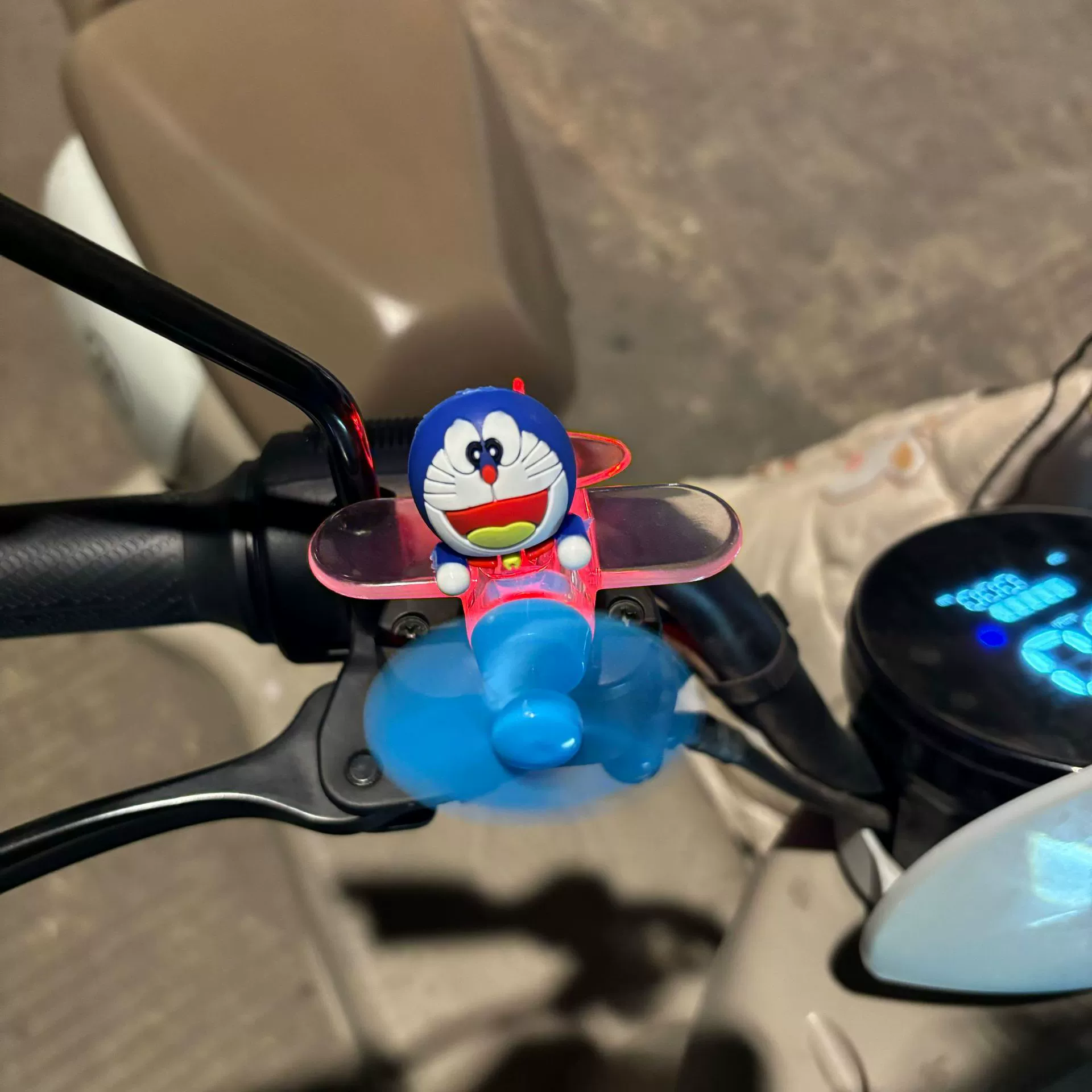 Electric car, glowing airplane, rotating decorations, generating electricity