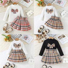 2025欧美INS简约女童蝴蝶结条纹上衣格子纹百褶裙套装一件代发