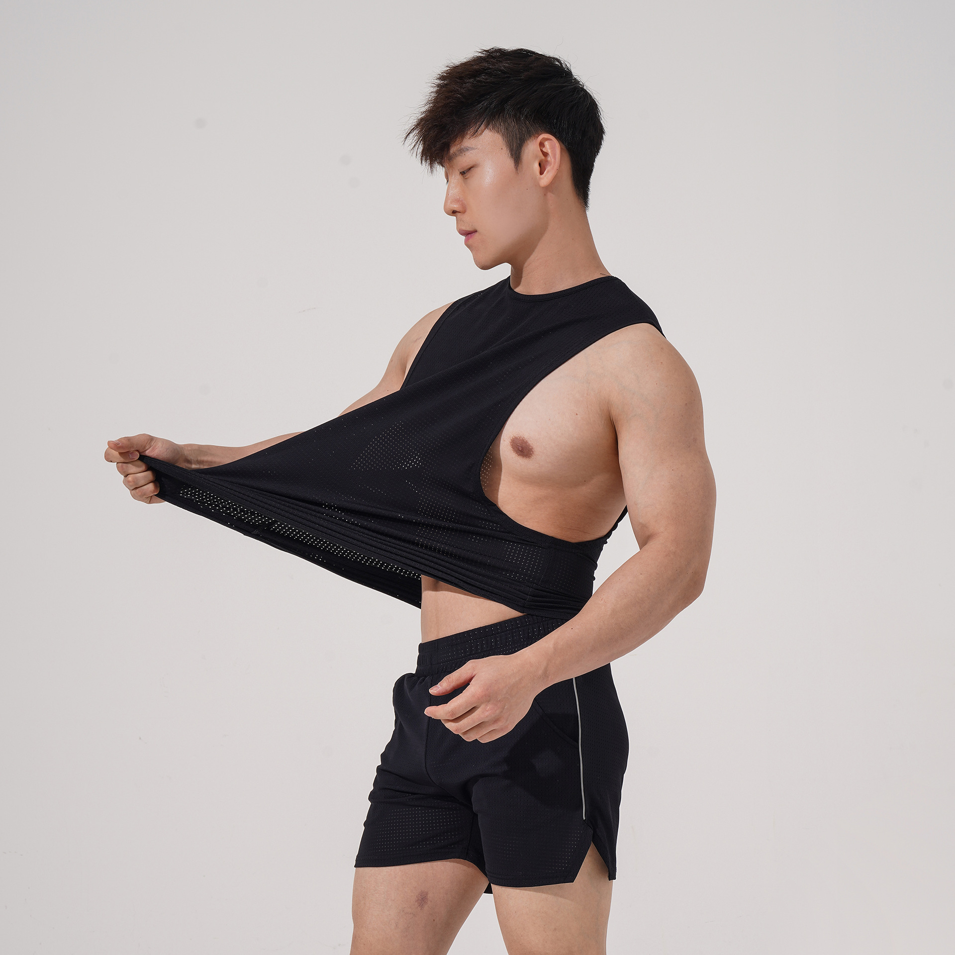 Chaleco transfronterizo de Europa y América malla de material de nylon de los hombres deportes gimnasio chaleco cuello redondo sin mangas en stock suministro