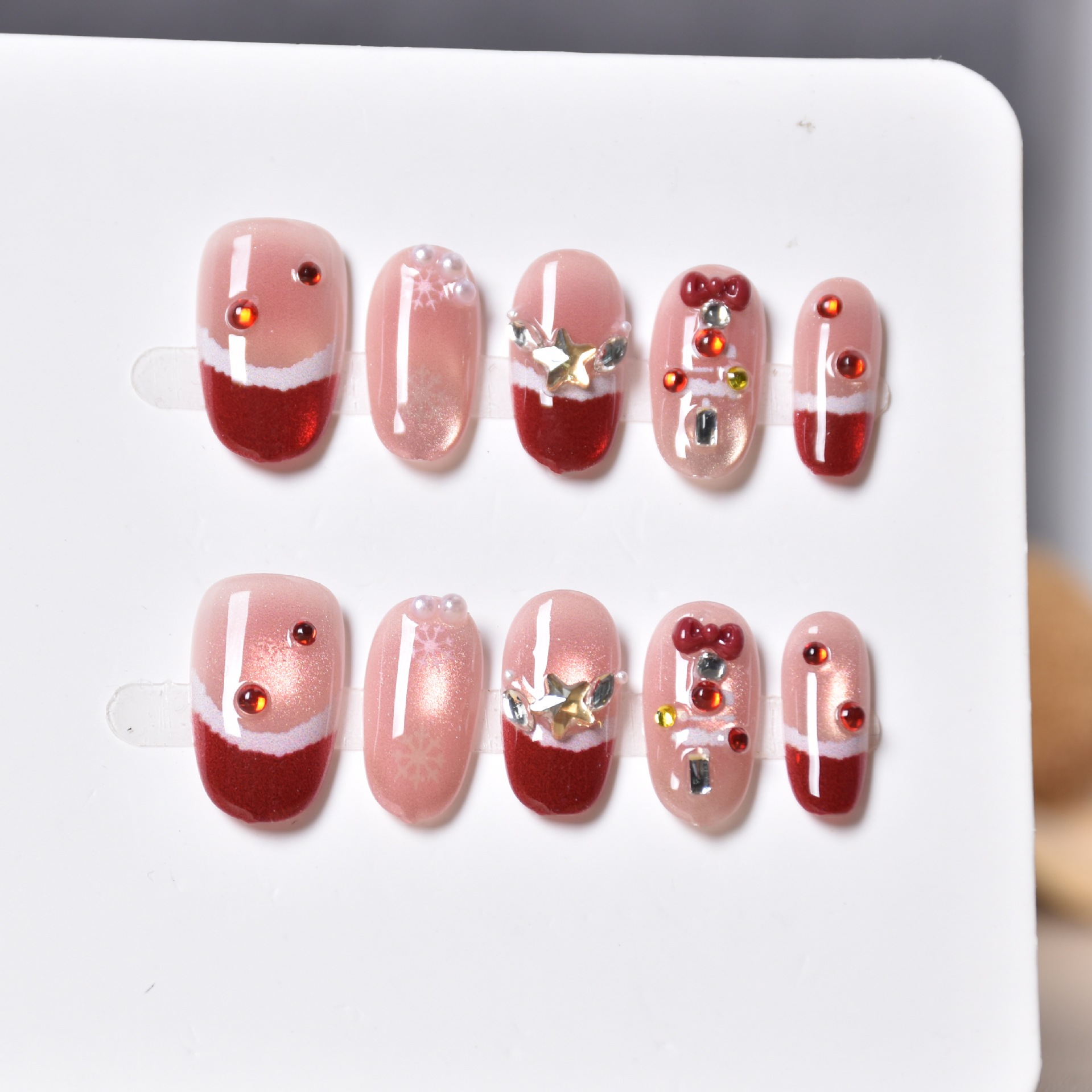 Navidad usa uñas elípticas cortas rojas francesas uñas arco blush copo de nieve uñas cubiertas usadas al por mayor