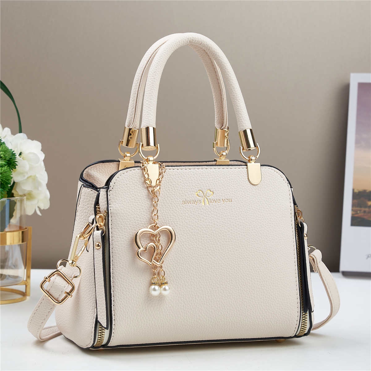 Bolso de mano de explosión bolso de mujer 2025 fabricante de comercio exterior nuevo bolso de hombro de verano atmósfera de moda universal