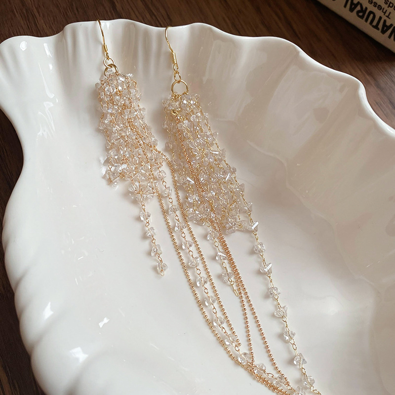 Pendientes de borla de cuentas de vidrio de súper hadas Pendientes de personalidad de temperamento de moda Pendientes de diseño exagerado de nicho Sentido de lujo ligero