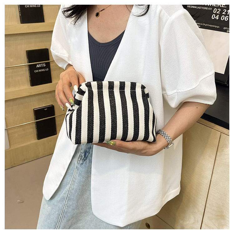 New cross-border fashion color-blocking striped cosmetic bag, women's loose change mobile phone storage bag, trendy and niche cloud clutch undefined