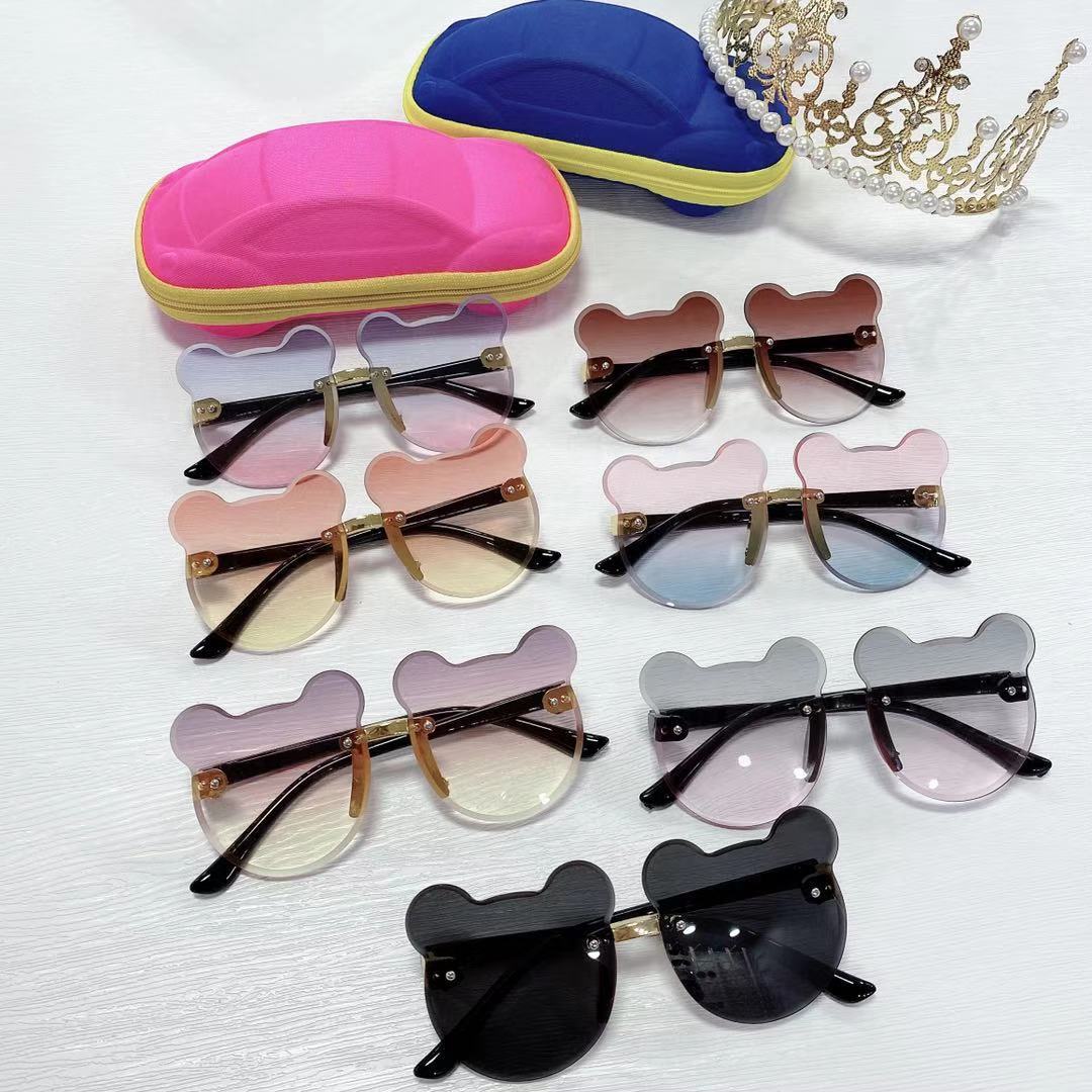 Nuevo oso gafas de sol de los niños raqueta de calle vanguardia moda calle raqueta copia pieza sin marco chica gafas de sol fábrica al por mayor