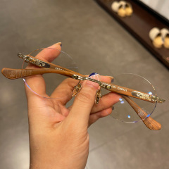 クロ星メガネフレームなし円形パンチングレトロ太子鏡男女超軽量近視鏡