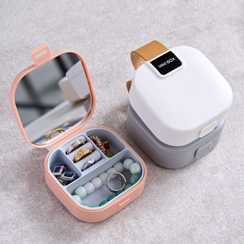 Suministro directo transfronterizo de viaje Mini caja de anillo Caja de joyería portátil pequeña Pendientes de cuero de plástico Anillo de almacenamiento de joyas
