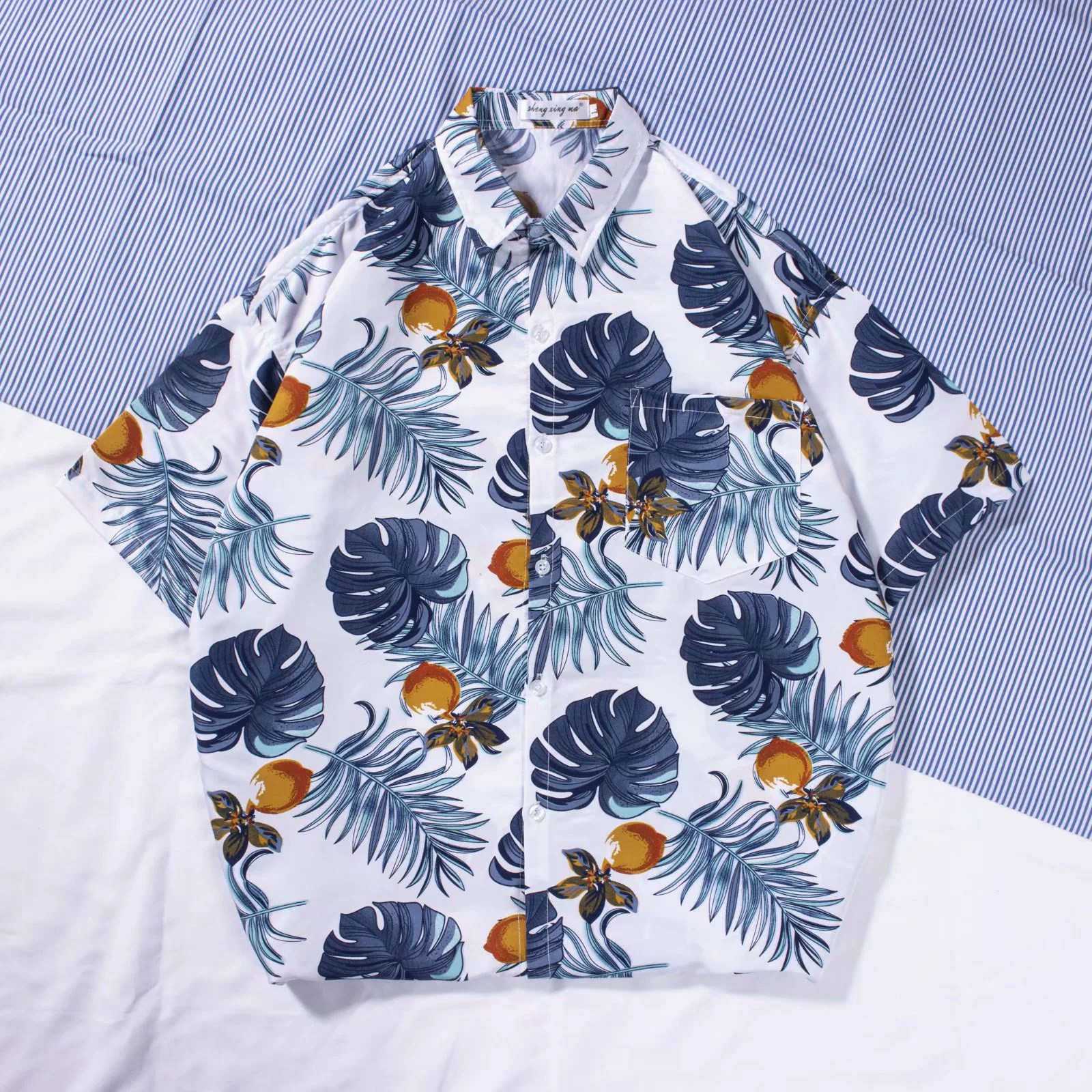 INS Super Fire Shirt Мужчинам Летняя рубашка Гавайи Bali Резорт Средний рукав на Хайнаньский остров, пляжный стиль