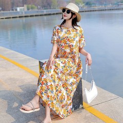 高級の良い綿のワンピースの夏の若いタイプの中年のお母さんのファッションの気質の新型の花の長いスカートの外で着ます。