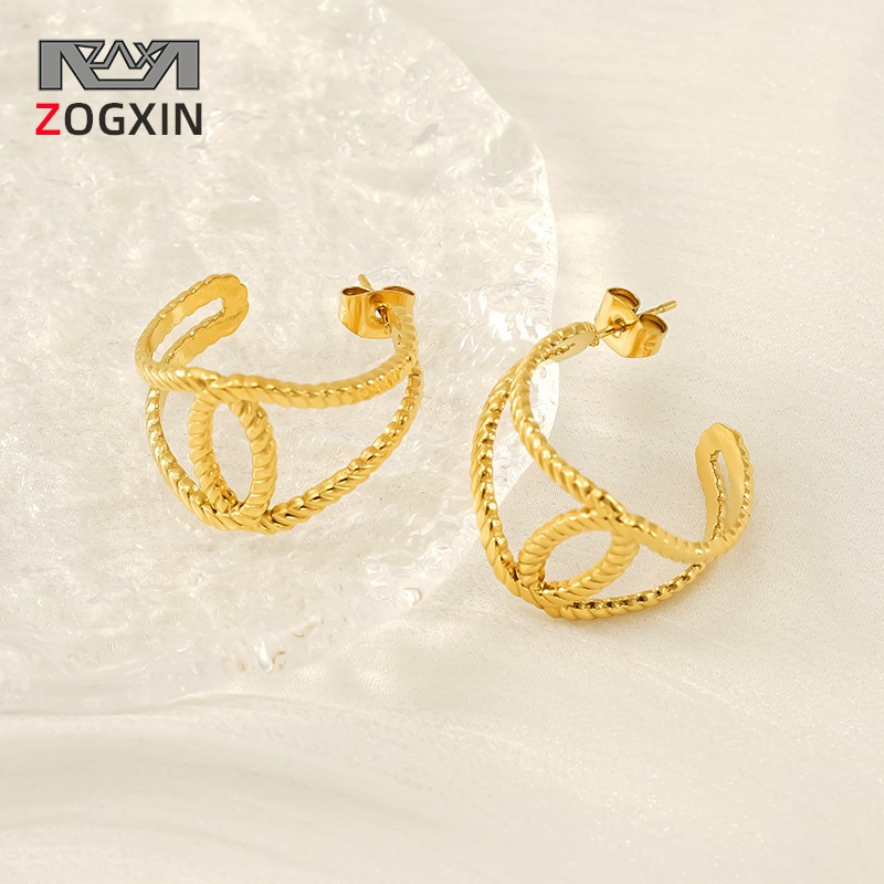 2024 nueva moda europea y americana, pendiente de diseño hueco geométrico de acero inoxidable, pendiente de temperamento simple y versátil, mujer