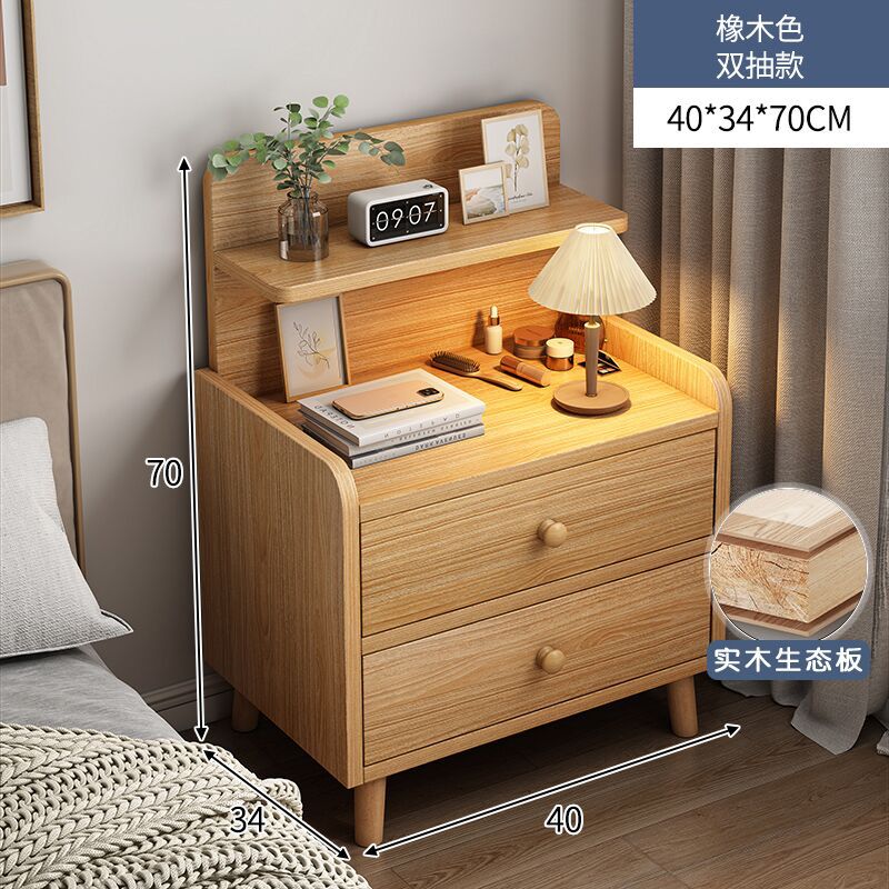 Mesilla de noche simple y moderno armario de almacenamiento de pierna de madera maciza pequeño dormitorio simple hogar 2025 nuevo estante de cabecera