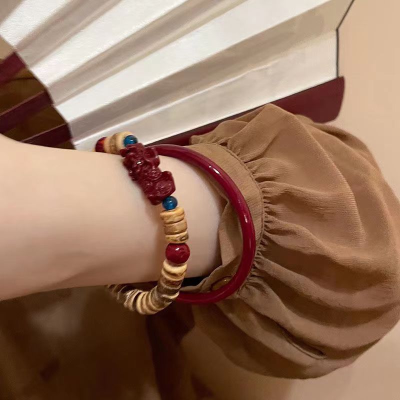 Nuevo estilo chino cáscara de coco cinabrio cuentas pulsera traje ins nicho diseño retro temperamento todo partido antiguo estilo pulsera