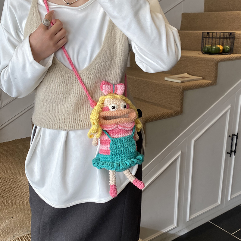 Caricatura encantadora mochila de hombro para niños y niñas ganchillo a mano muñeca de boca grande mochila para niños otoño y invierno nueva bolsa para niños