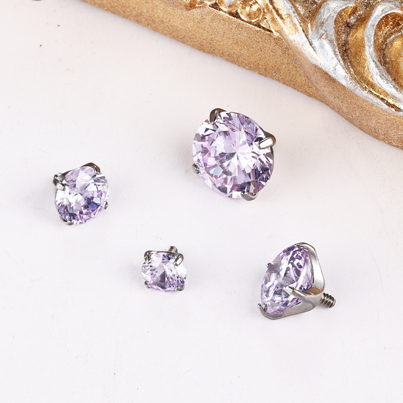 Silver pointed spike labret stud material detail