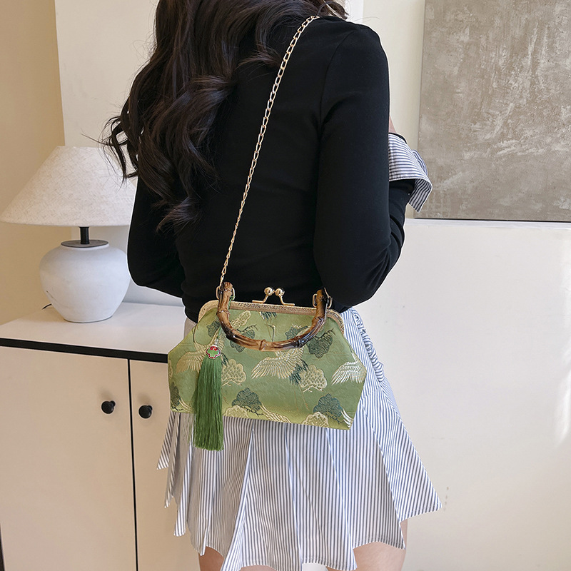 Elegant Small Shell Bucket Bag With Tassel And Bamboo Handle_voghion.com