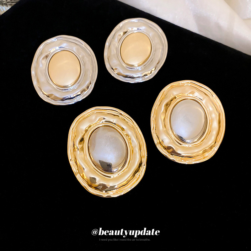 Pendientes elípticos exagerados transfronterizos de metal con aguja de plata Pendientes de moda de nicho europeo y americano Pendientes de lujo ligero simples y de alta gama mujeres