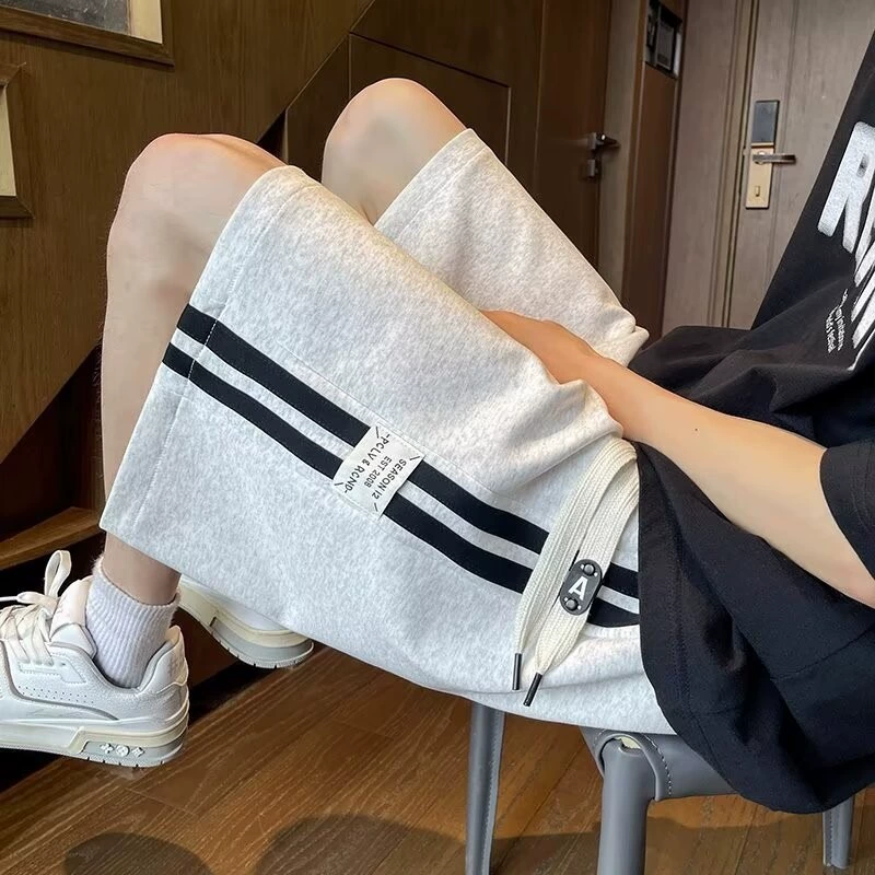 Новинка 2025 года, летние мужские свободные модные повседневные универсальные шорты с пятью точками, шорты с цветными блоками, свободные спортивные крутые шорты