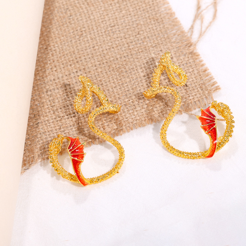 Nuevo cross-border personalizado flying dragón auriculares nicho de moda retro diseño sin agujeros de orejas para hombres y mujeres usar auriculares de alto nivel