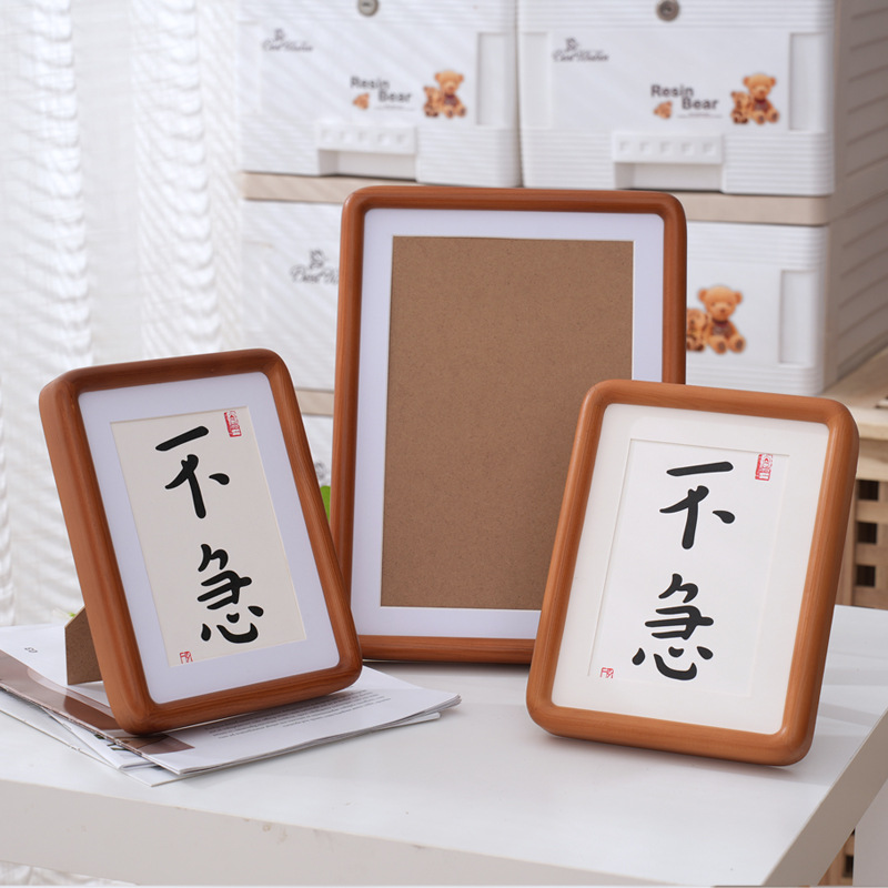 Peach photo frame rounded from natural wood