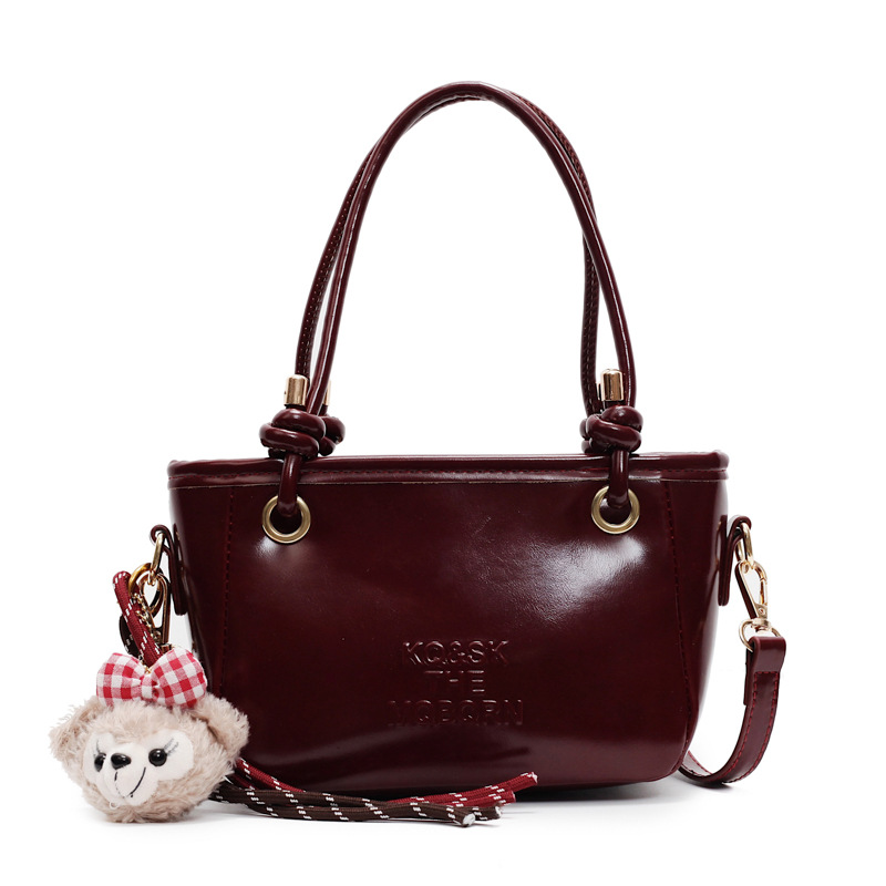 Bolsa de cubo retro explosiva para mujeres 2025 nuevo bolso de nicho de diseño de alta humedad versátil bolso de hombro