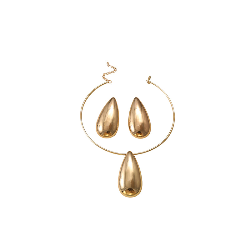 Europa y los Estados Unidos ventas calientes de viento frío oro gota colgante collar conjunto de pendientes de nicho diseño de moda