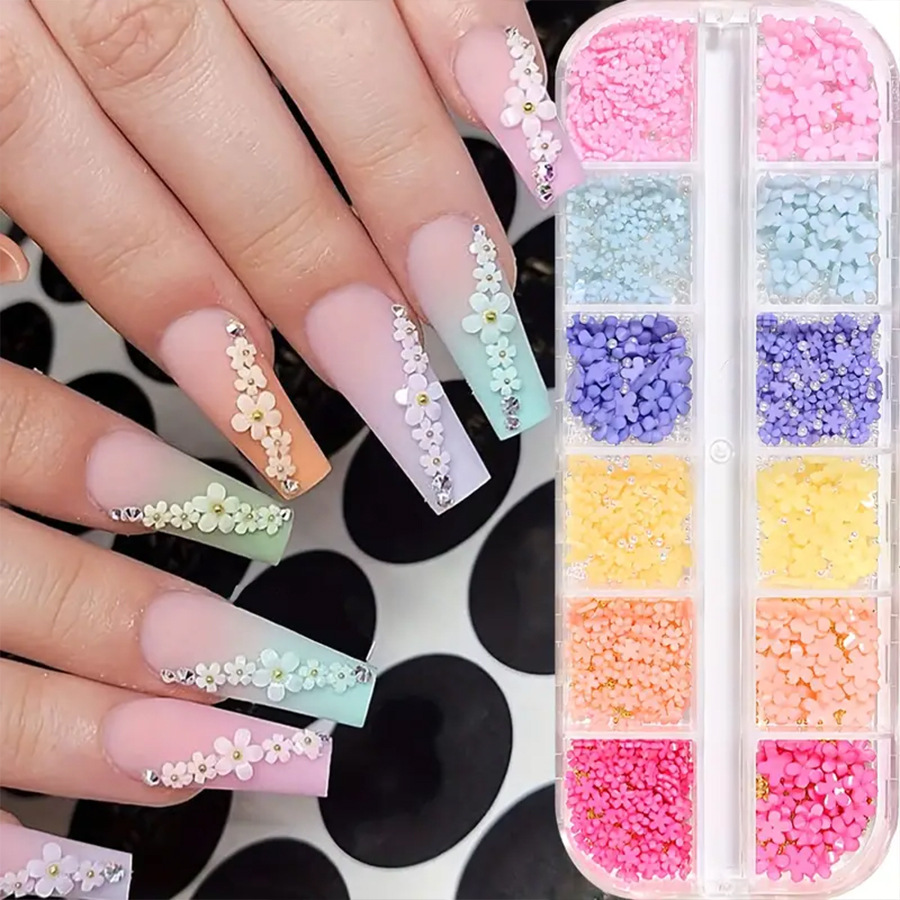 Accesorios de uñas calientes transfronterizos 12 grados de resina tridimensional de cinco flores de perlas mezcladas accesorios DIY