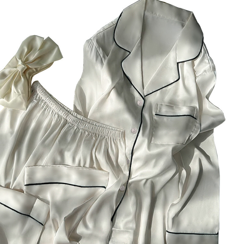 純色のシンプルな氷の女性のパジャマ春と秋の長袖の小さい大衆のプリントの家庭服の2つのセットは実際に卸売りをたたきます。|undefined