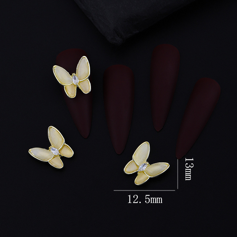 Accesorios de uñas Opal Mariposa nueva flor de lujo ligero Aleación de diamantes accesorios pegatinas de uñas decoración de diamantes de imitación al por mayor