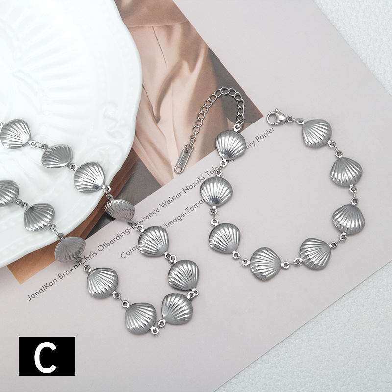 Collier et bracelet papillon coquillage en acier inoxydable_voghion.com