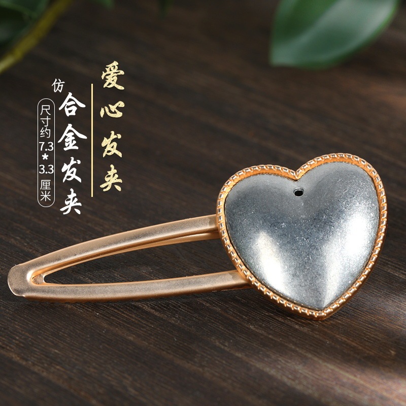 宋錦藍染刺繍部品のネジの下に髪を支えて布を包みます。|undefined