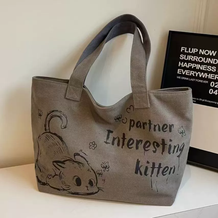 Повседневная большая вместительная холщовая сумка для женщин 2025 Новый модный портативный шоппинг-мешок для поездок и повседневного использования через плечо
